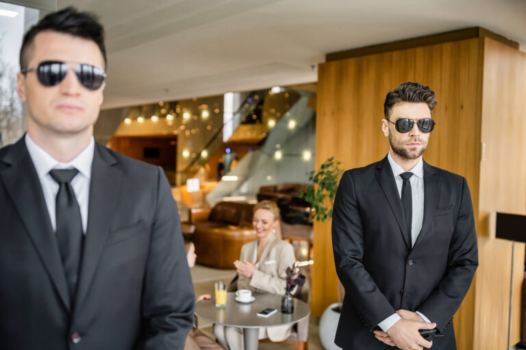 Security professionals wearing suits in a restaurant