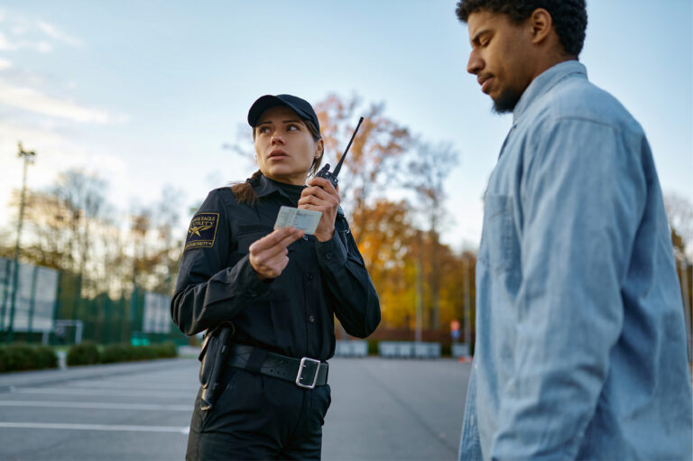 Security officer checking identification
