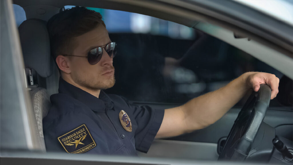 GES Male Guard on Patrol in Car 2 neo sm
